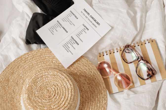 travel checklist on the bed